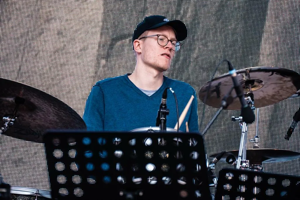 Lasse Corus, SJARK co-founder, playing drums