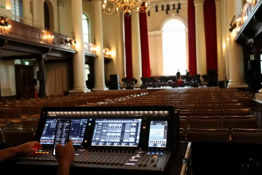 SJARK engineer checking sound in a historic venue