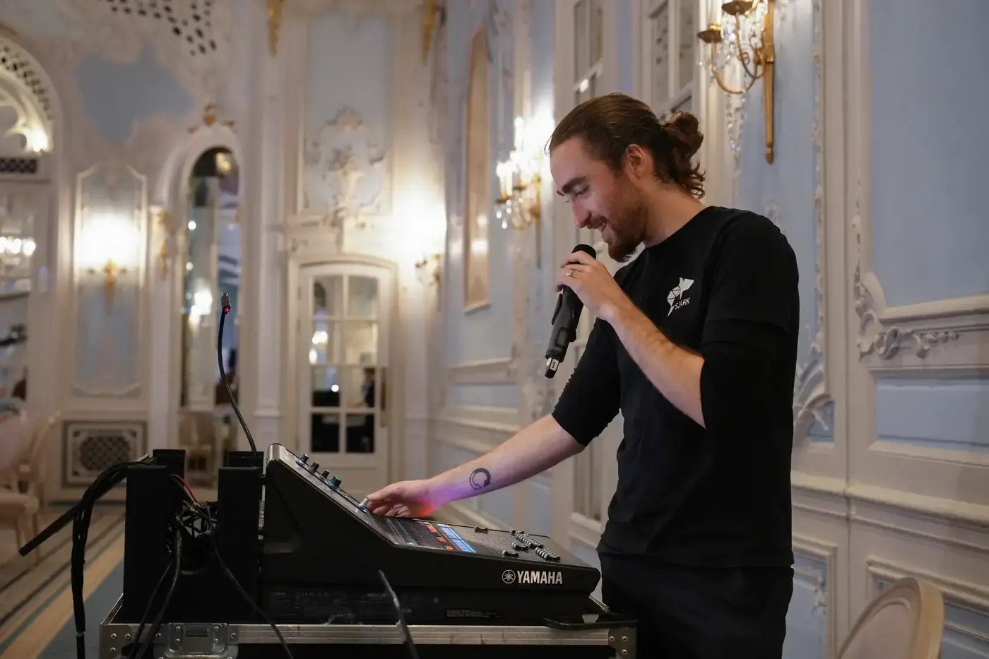 SJARK engineer at the sound desk during a Savoy event