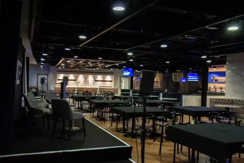 Staging and lighting rig in a dark venue